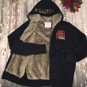 Pink VS faux fur lined black hooded sweatshirt...